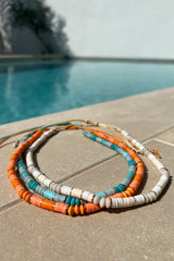 Bead Patterned Cord Back Necklace in Coral